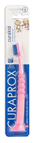 Детская зубная щетка Curaprox / Курапрокс Curakid CK4260 от 0 до 3 лет с мягкой щетиной и гумированной ручкой, розовая / гигиена полости рта